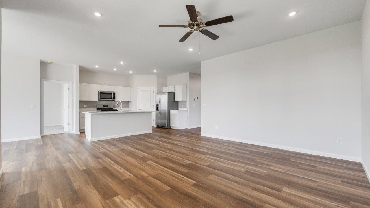 kennebec paired villa erie open layout kitchen and living room with lvp