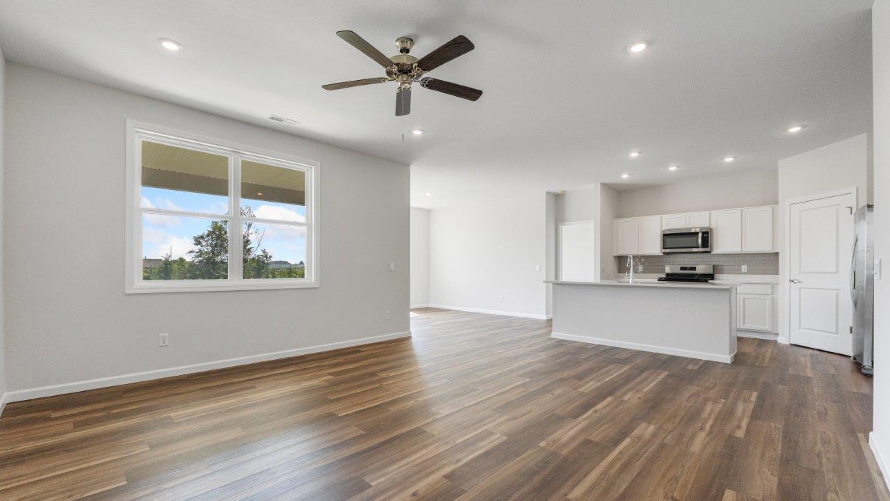 kennebec paired villa erie open layout kitchen and living room with lvp