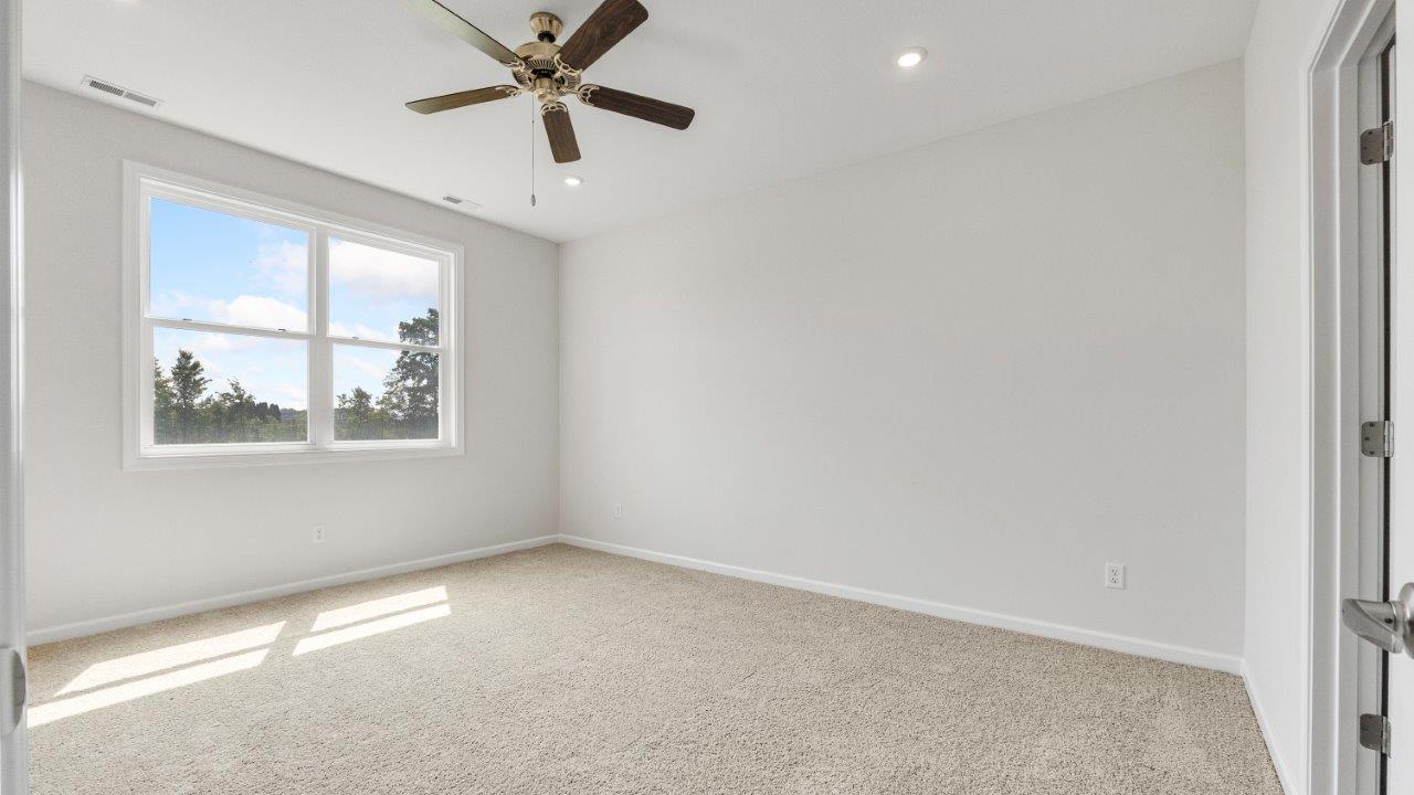 kennebec paired villa erie primary bedroom