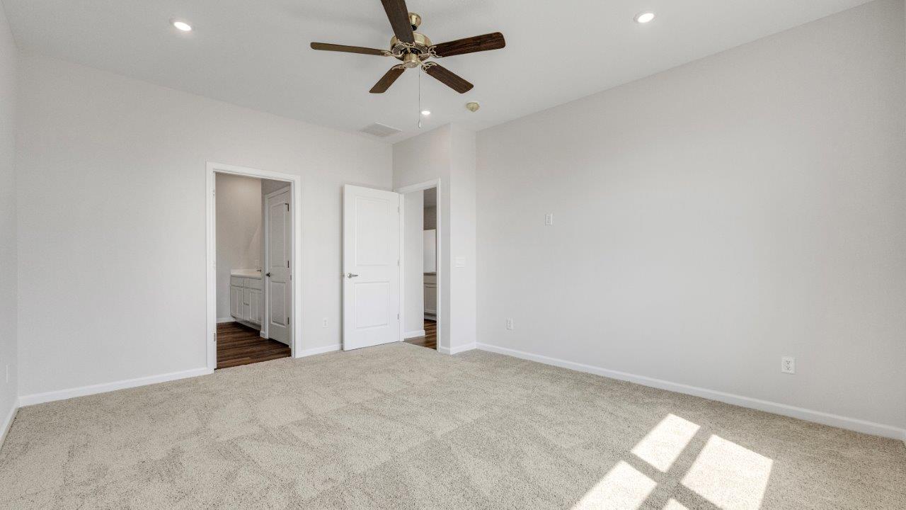 kennebec paired villa erie primary bedroom