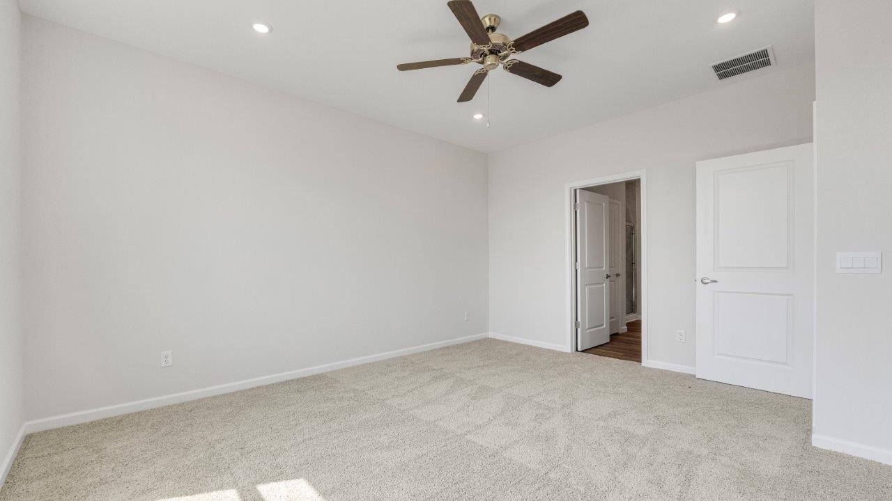 kennebec paired villa erie primary bedroom