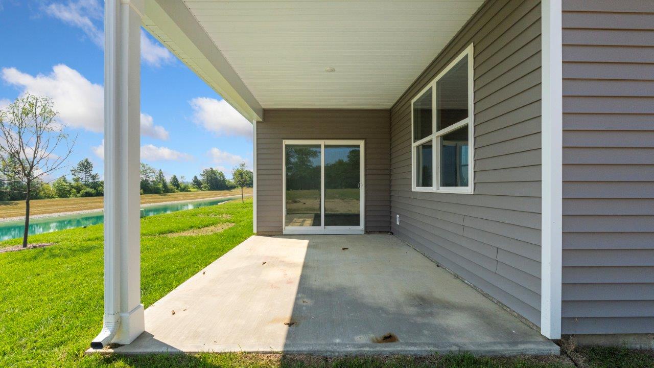 kennebec paired villa erie rear exterior with covered patio