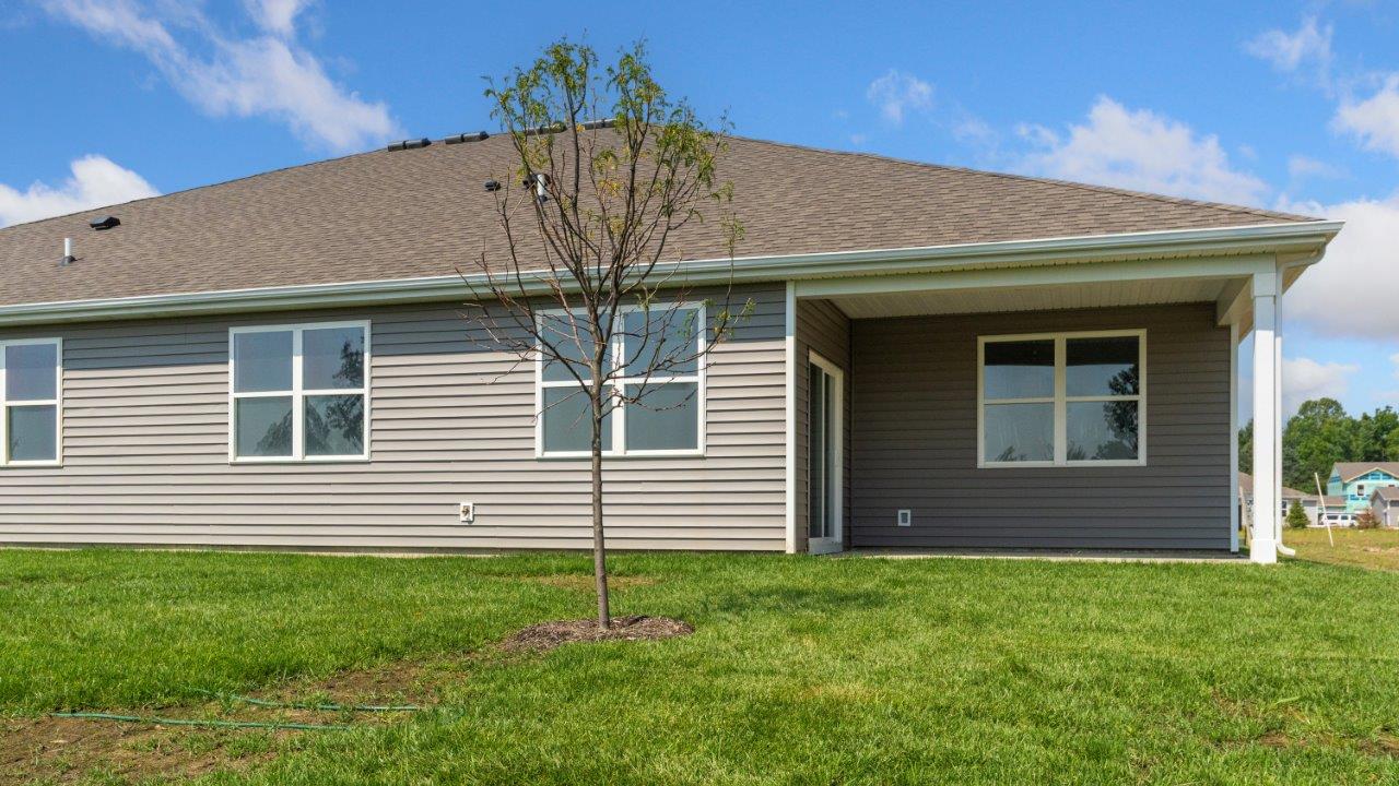 kennebec paired villa erie rear exterior with covered patio