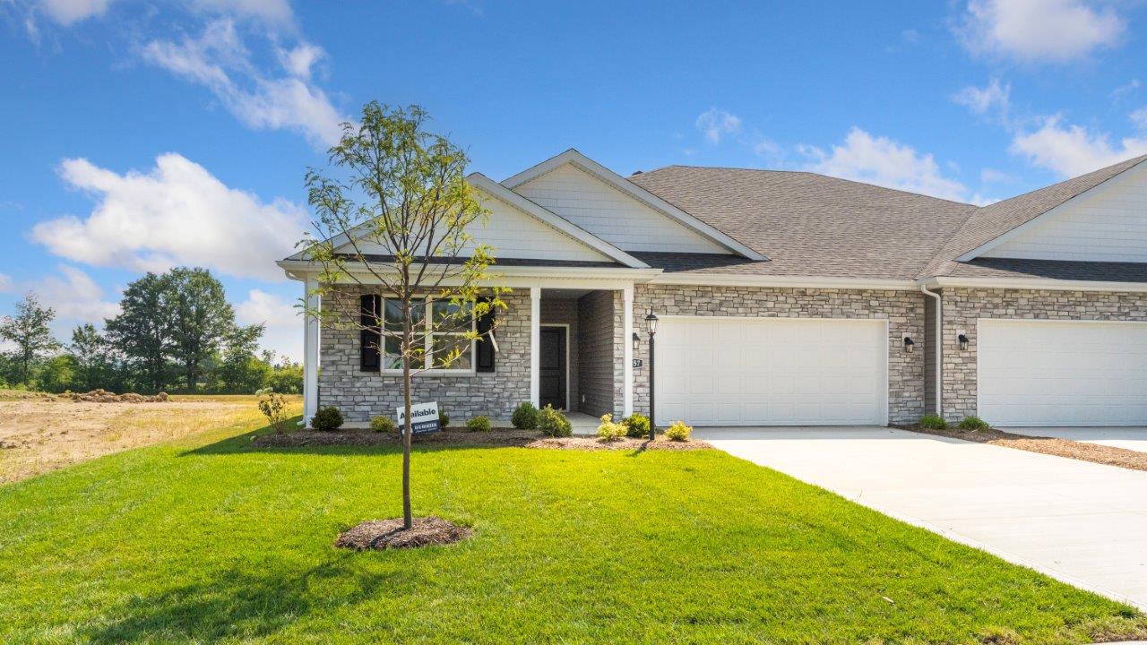 kennebec paired villa erie exterior with landscaping and sod