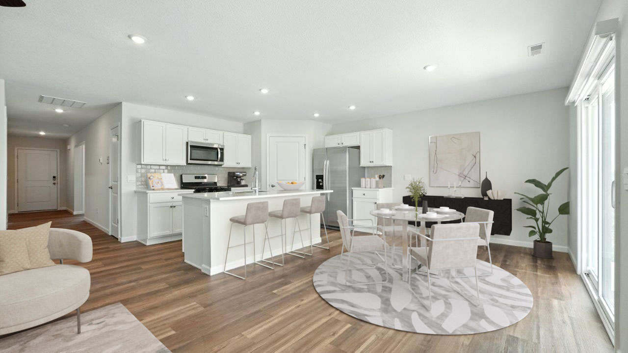 hardin dining space with lvp and sliding glass door to backyard