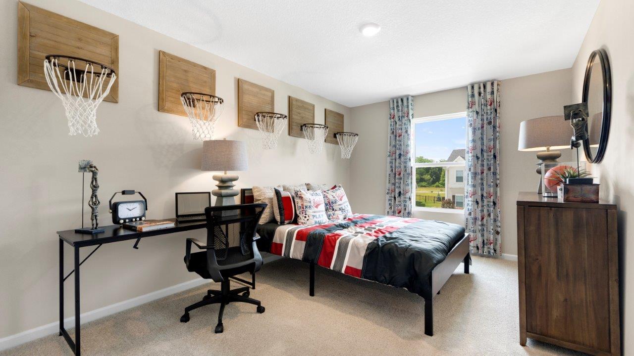 bedroom 3 with beige carpet and popular grey walls