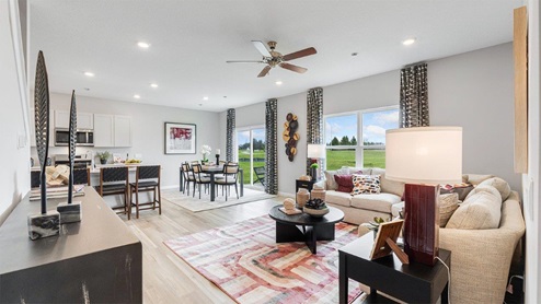 belmont woods henley model great room with lvp in open layout