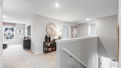 belmont woods henley model upstairs living space with carpet