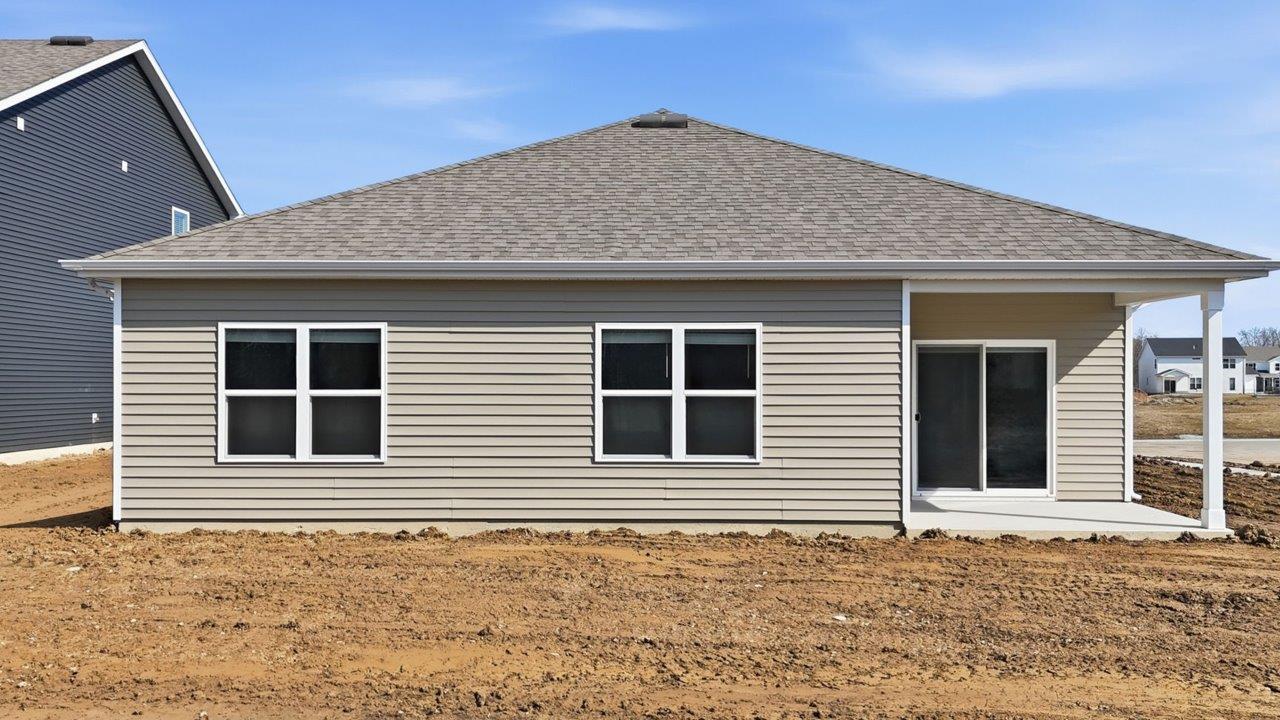 rear exterior with covered patio