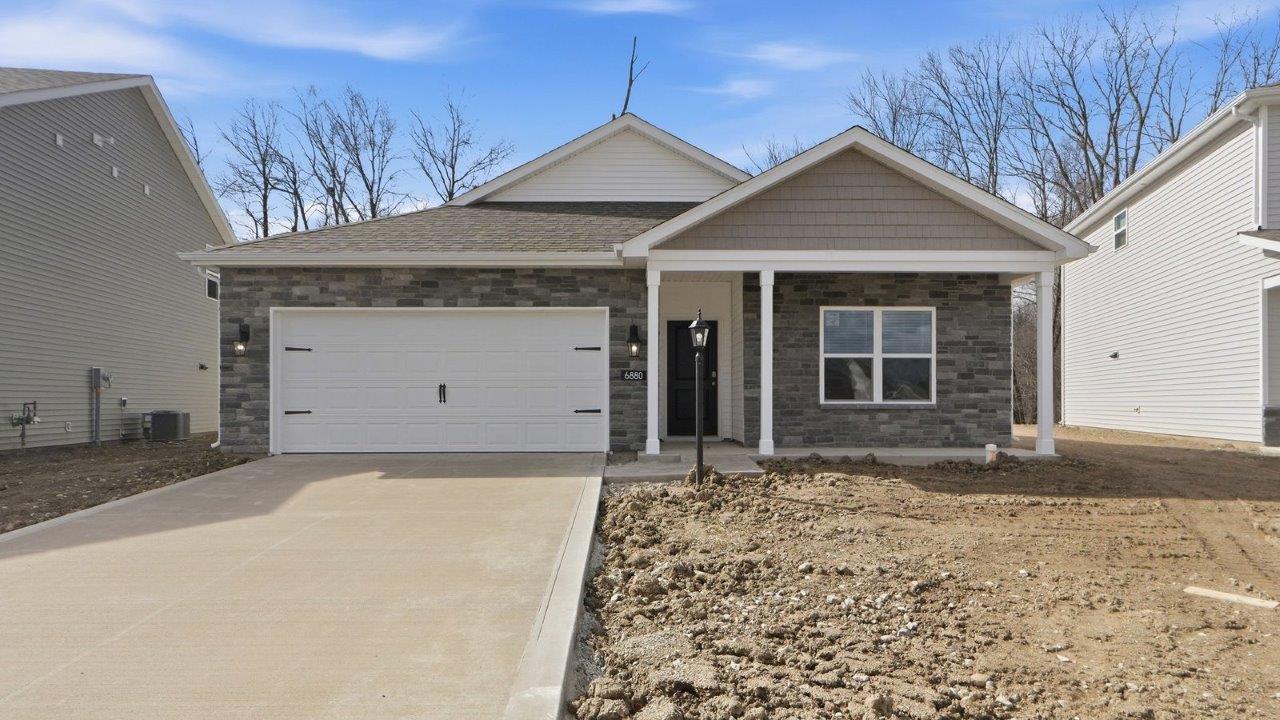 belmont woods chatham exterior with covered front porch and 2 car garage