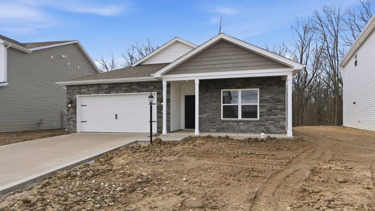 belmont woods chatham exterior with covered front porch and 2 car garage