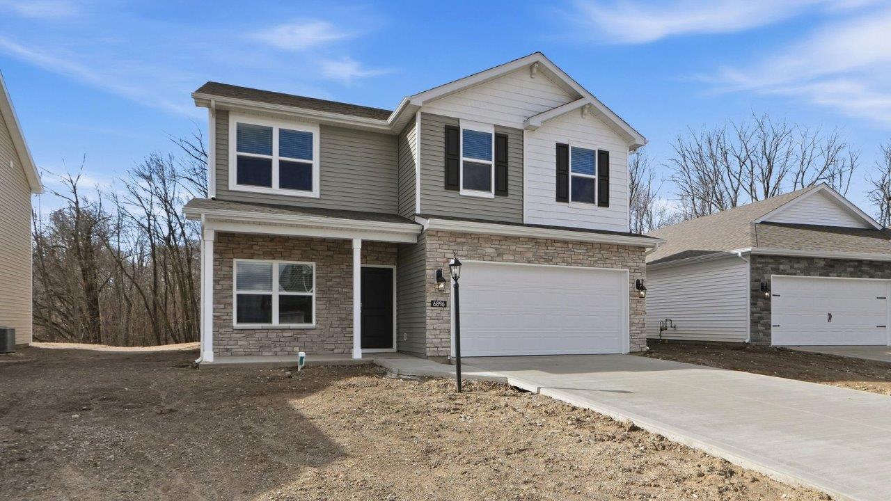 belmont woods bellamy plan with 2 car garage and covered patio