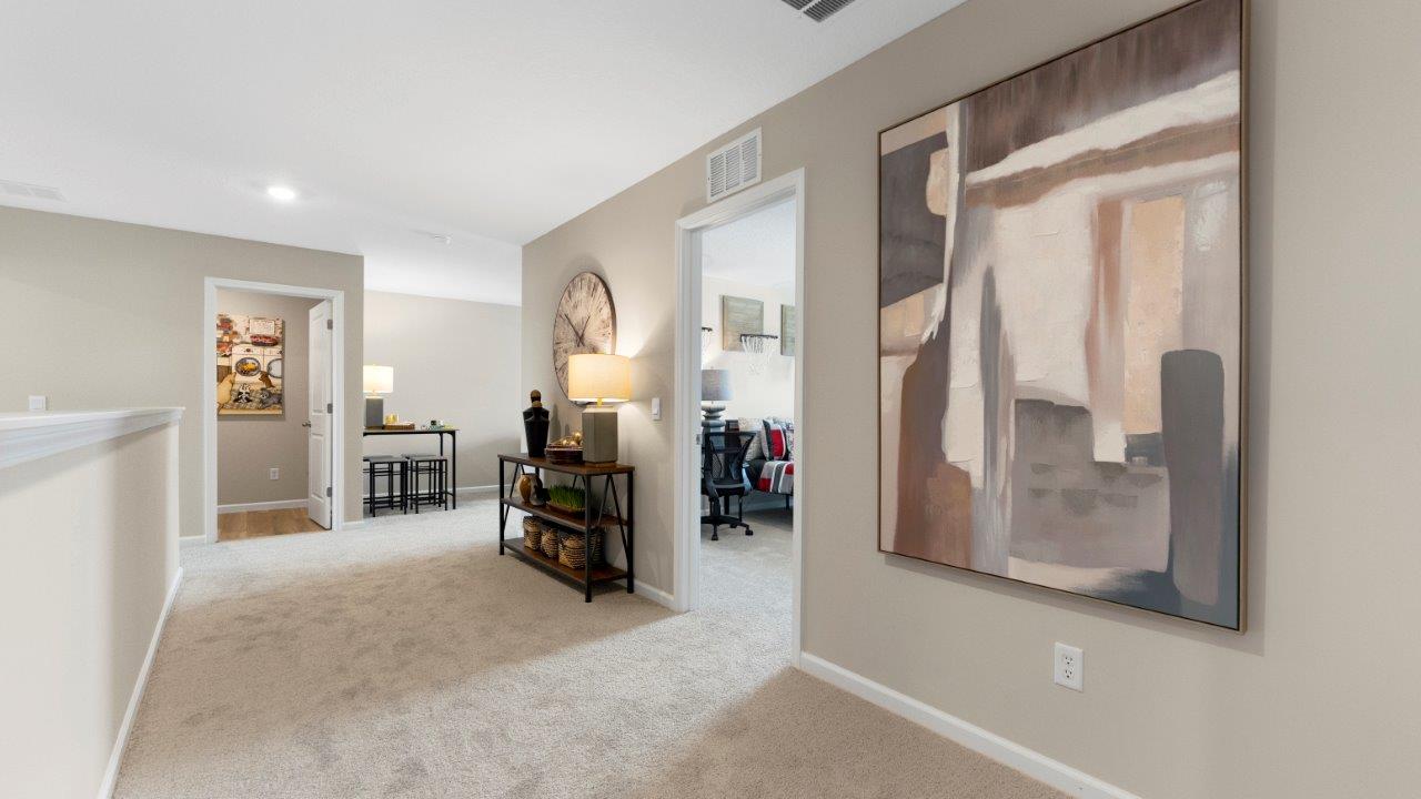 Henley upstairs foyer open to secondary living space leading to bedrooms