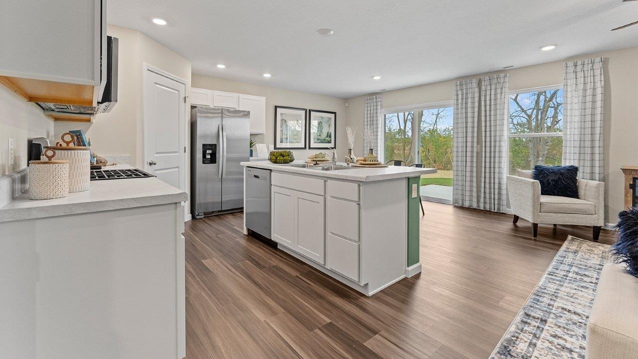 harmony kitchen with large center island with quartz coutners