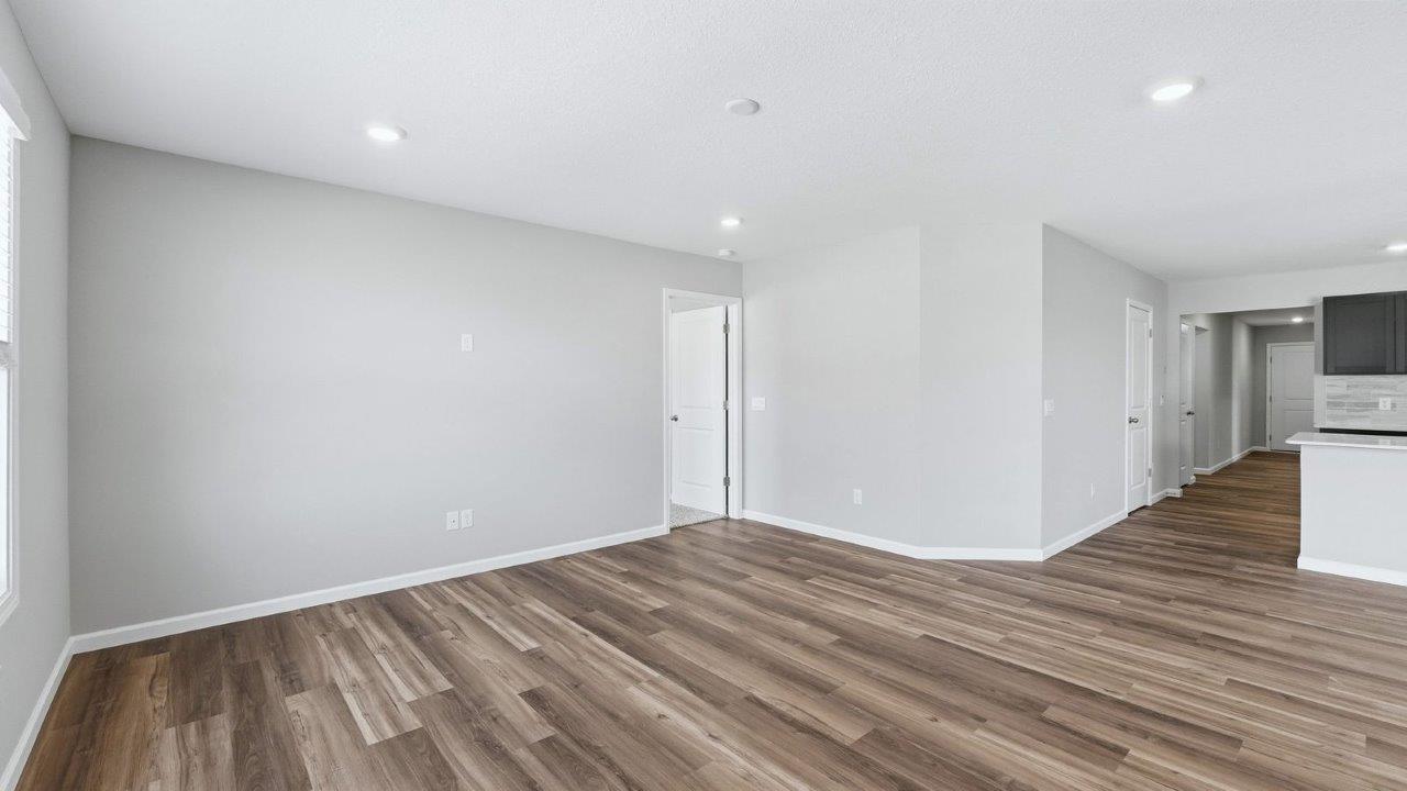 foyer leading into living room with lvp flooring