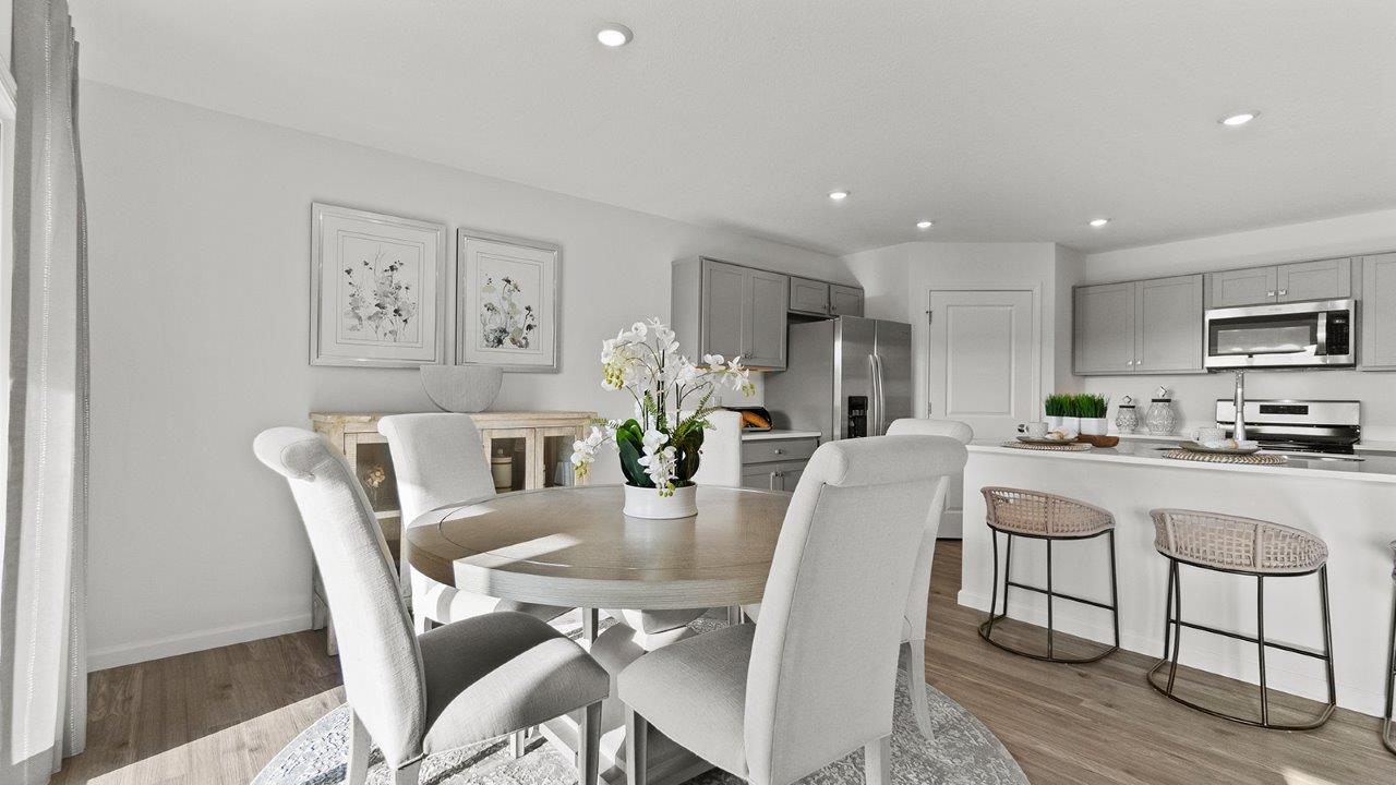 dining space with sliding door to backyard