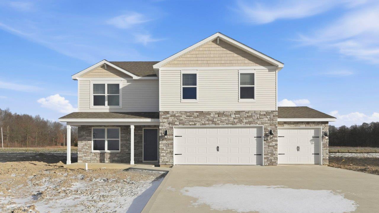 parlor bluffs henley exterior with 3 car garage