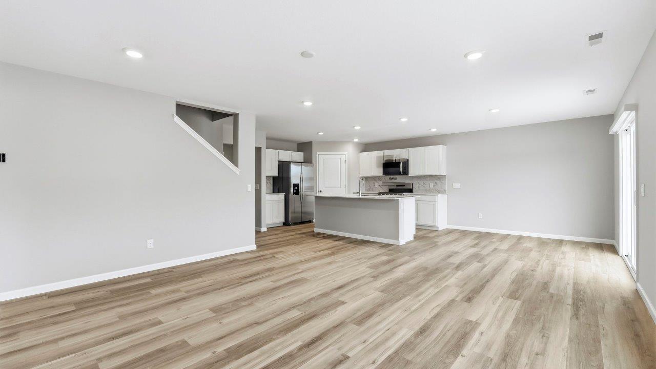 open plan living room with lvp