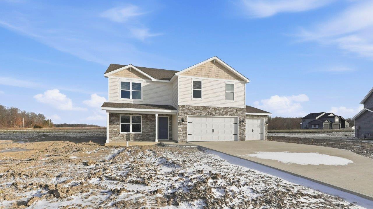 parlor bluffs henley exterior with 3 car garage