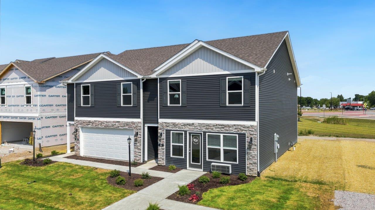 Whispering Pines Pattison Model - exterior with landscaped and sodded yard