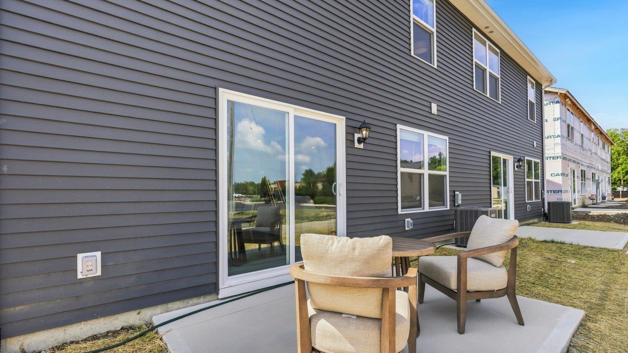 Whispering Pines Pattison Model - rear exterior with concrete patio