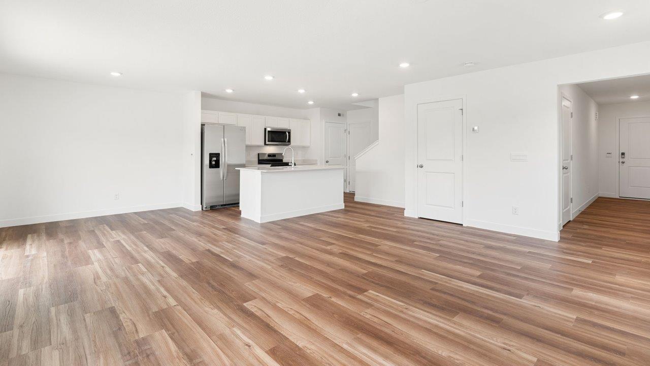 whispering pines portsmouth - open layout kitchen, living room, and casual dining room