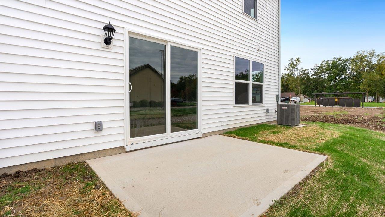 whispering pines portsmouth - rear exterior with concrete patio