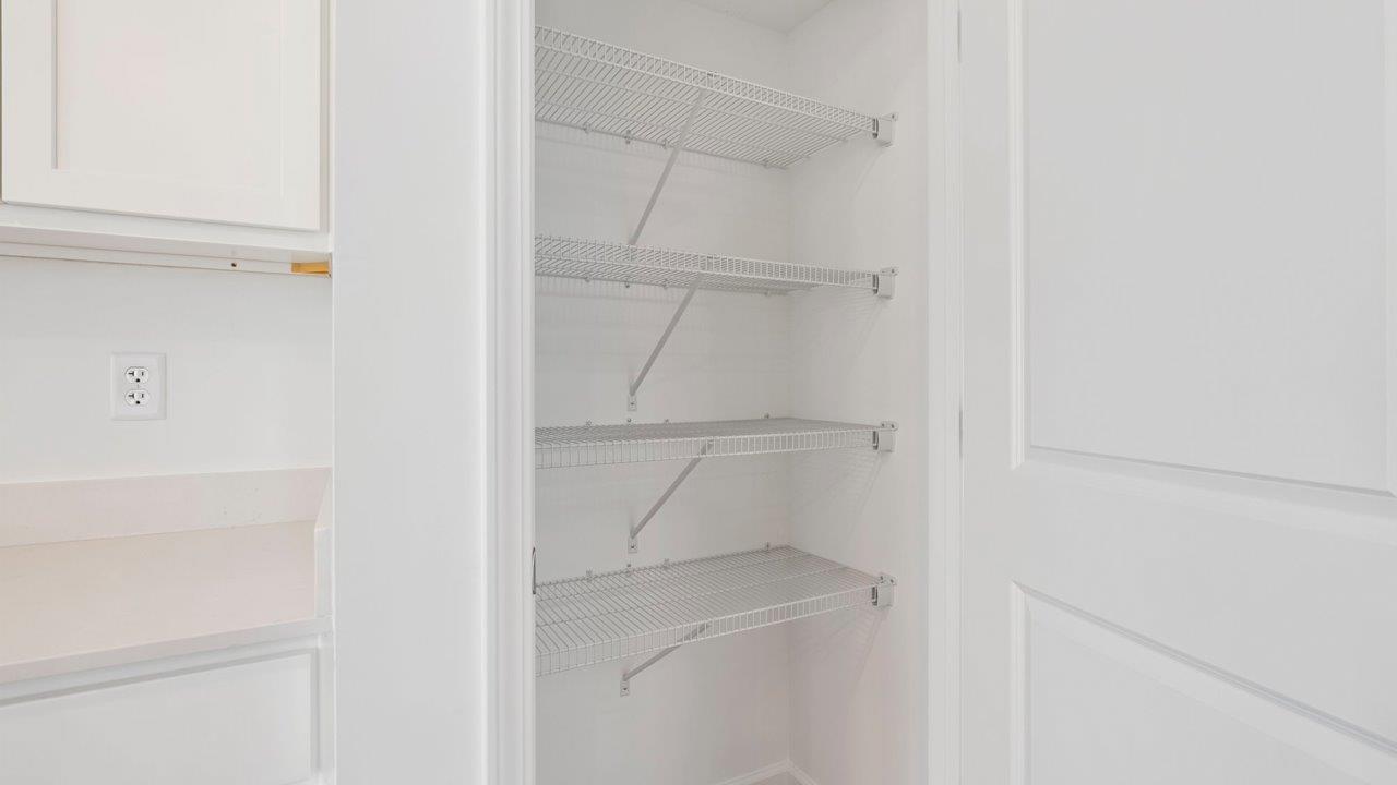 kitchen pantry with built in ventilated shelving