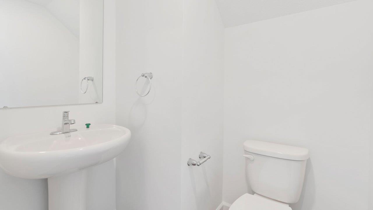 first floor powder room with pedestal sink