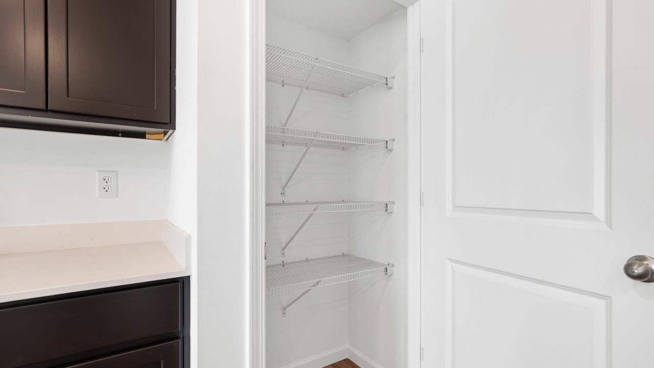 kitchen pantry with built in ventilated shelving