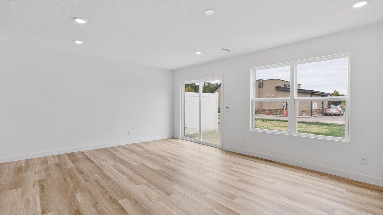 whispering pines pearson - open layout living room with mohawk lvp flooring