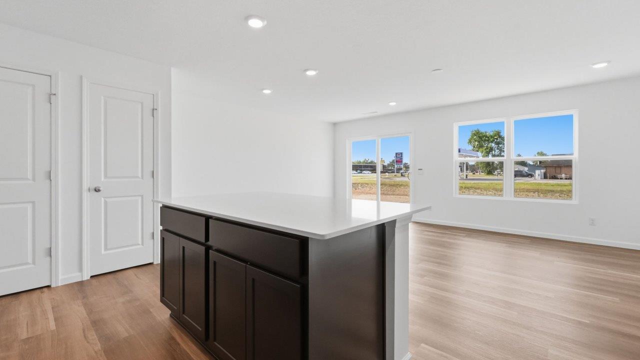 whispering pines pearson kitchen island overlooking living and dining rooms