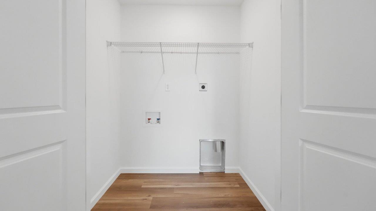 whispering pines pearson second floor laundry room with shelving
