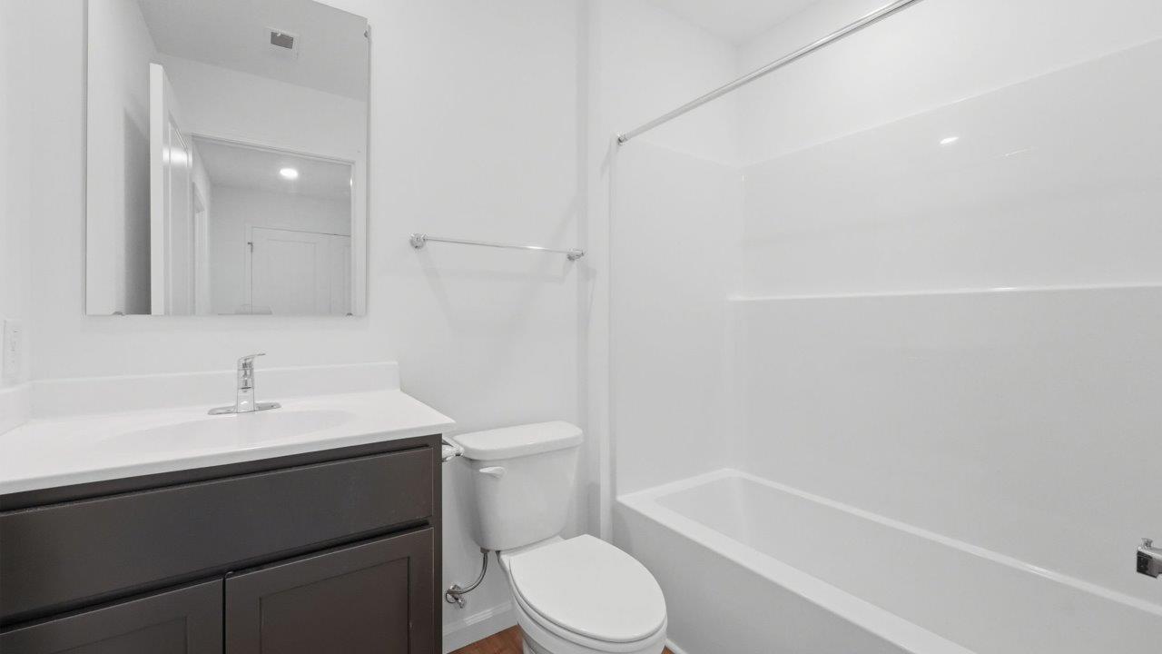 whispering pines pearson full bathroom with single sink vanity and tub shower