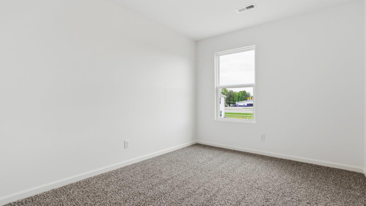 bedroom 2 with carpet flooring