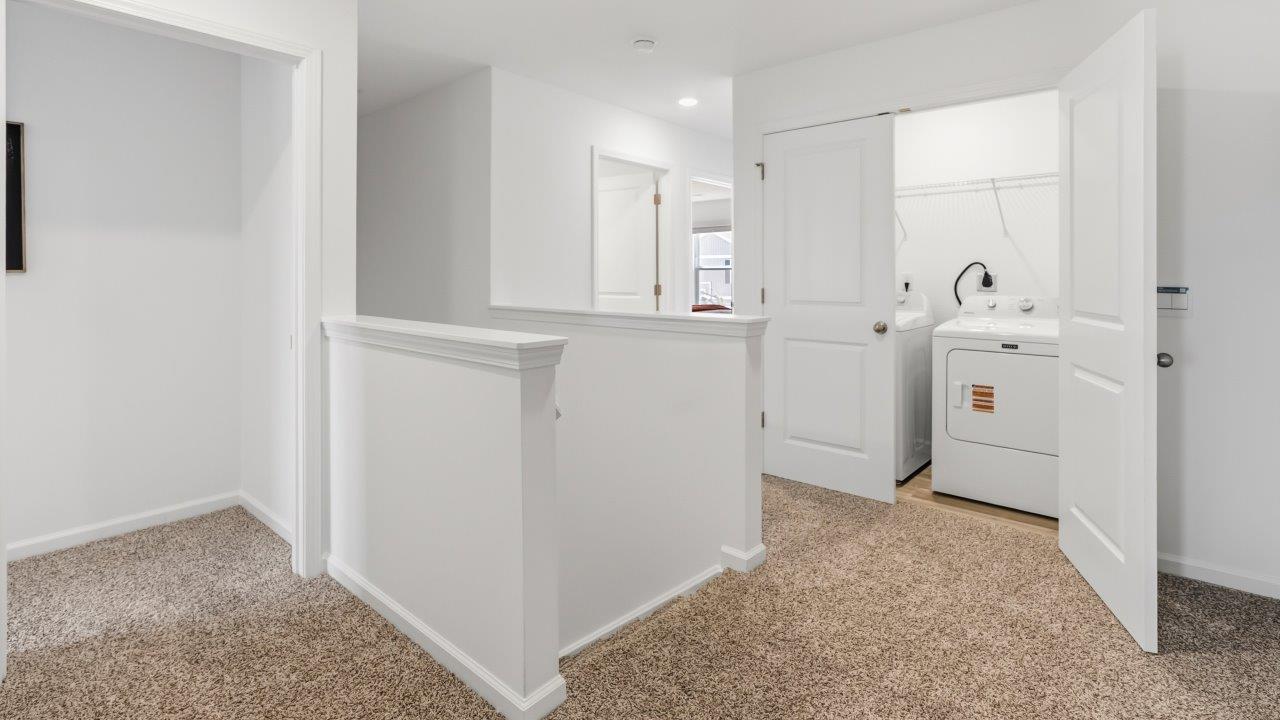 whispering pines pattison plan interior model home - staircase landing