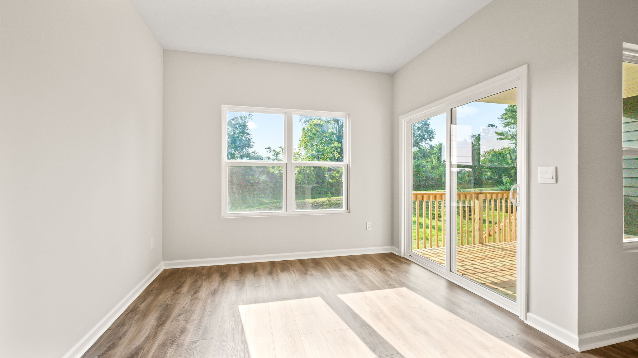 Dining area leading to sliding door to backyard