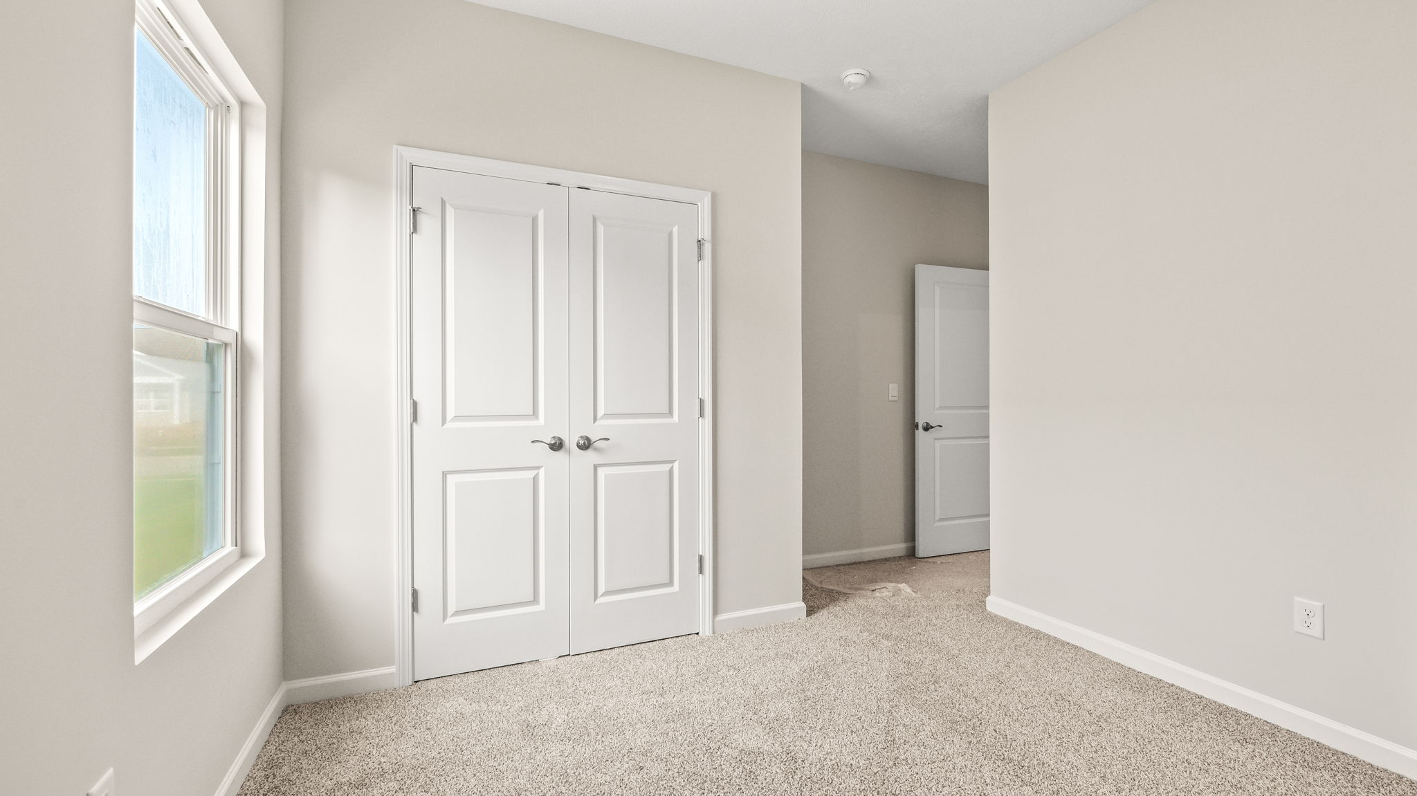 Carpeted bedroom