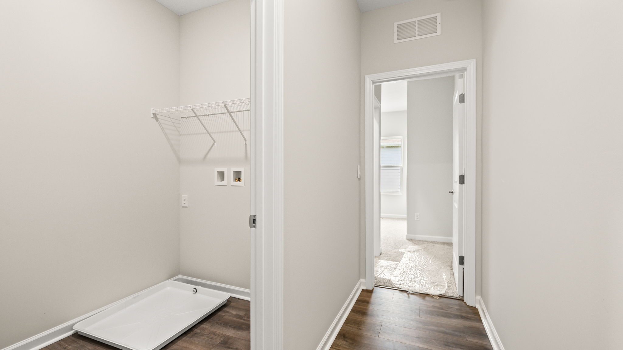 Laundry area next to bedroom