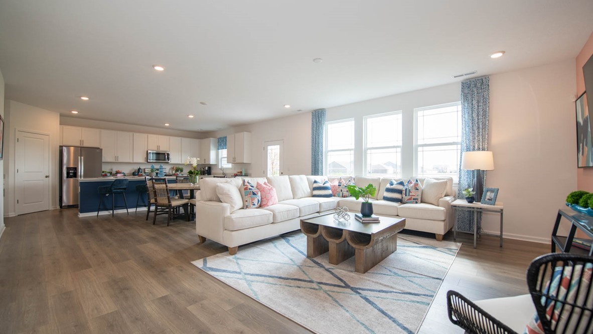 great room with living room and large windows