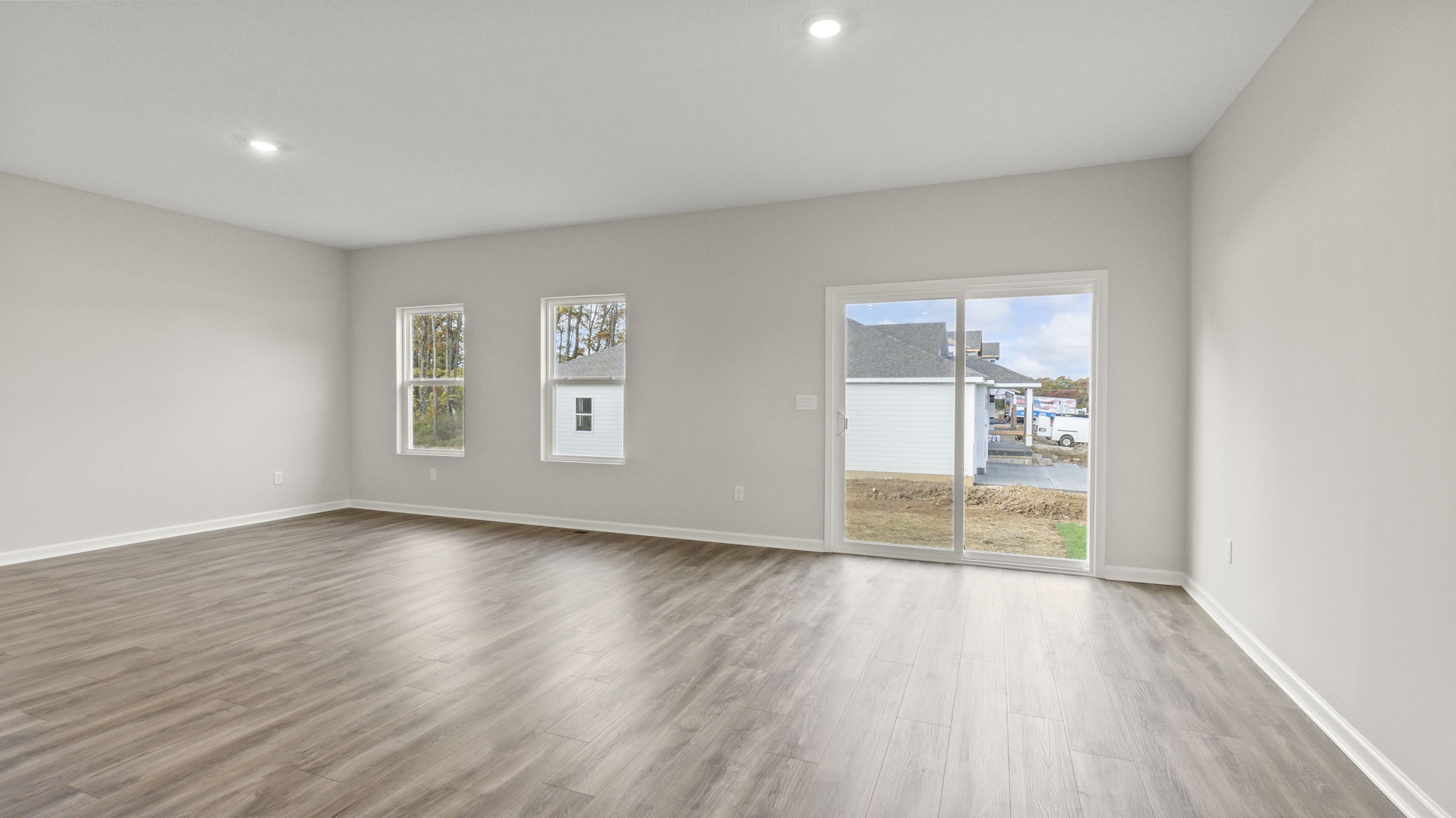 Full great room with sliding door to outside.