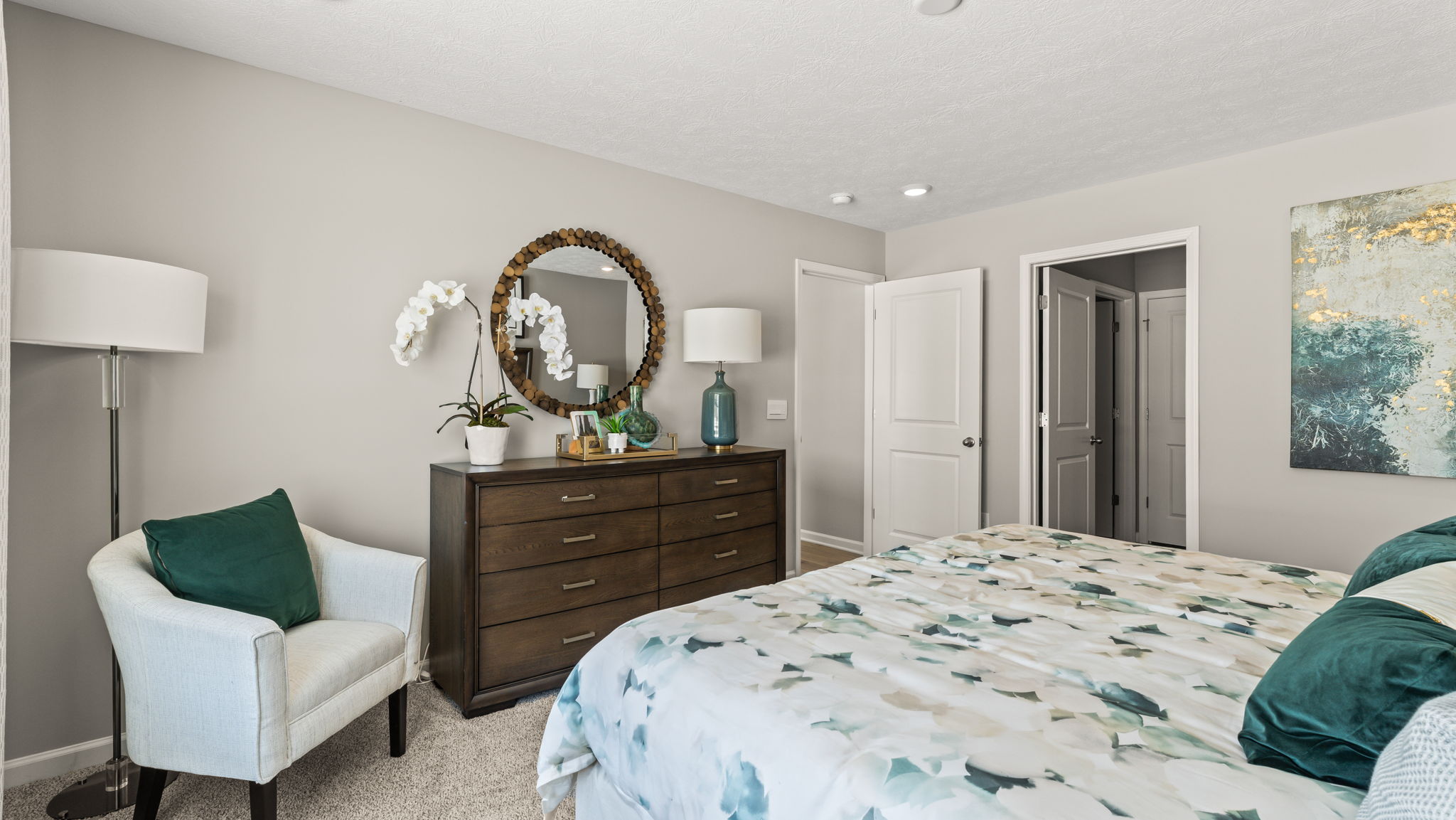 Primary suite with view of the primary bathroom