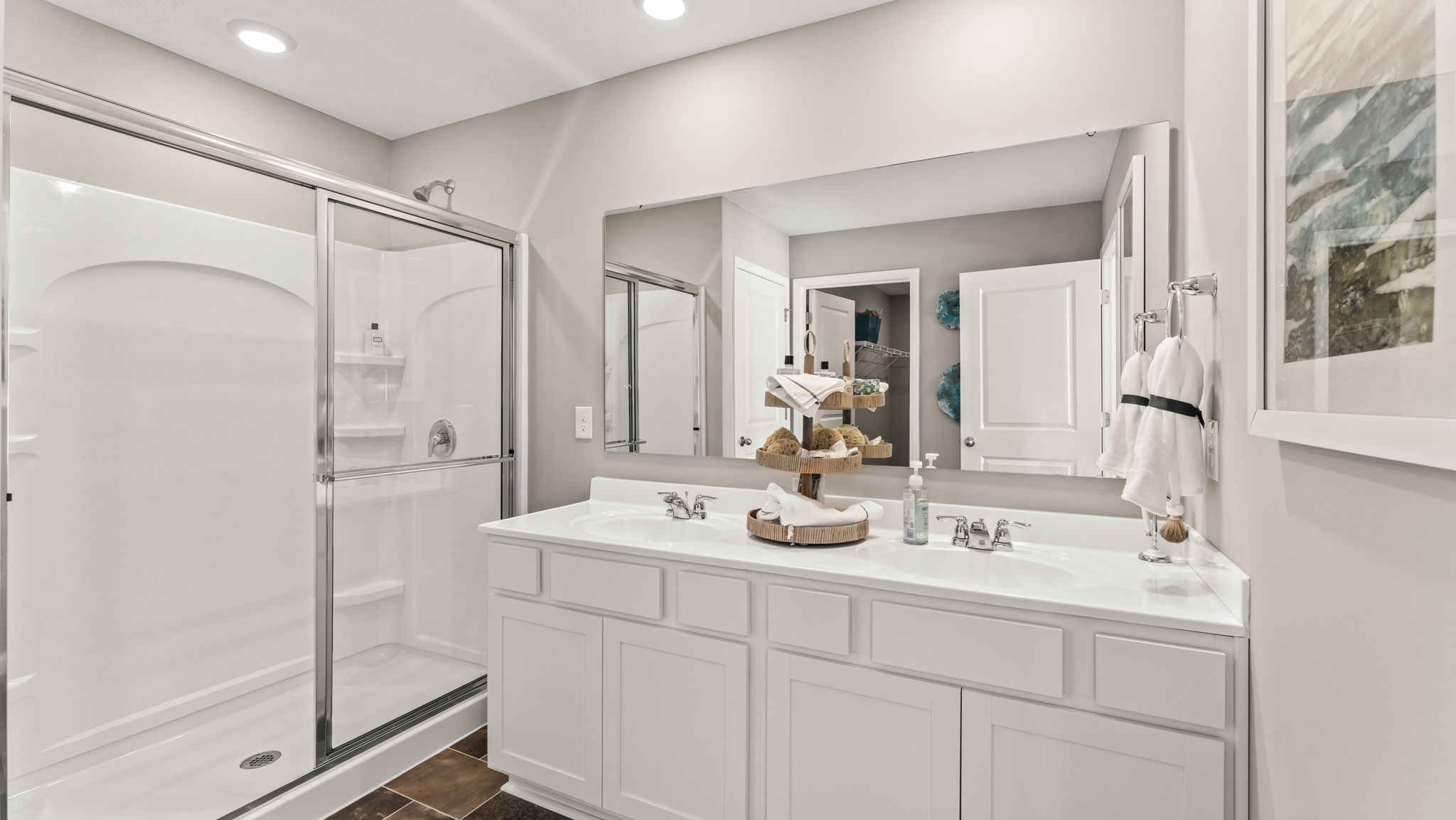 Wide image of the primary bathroom suite