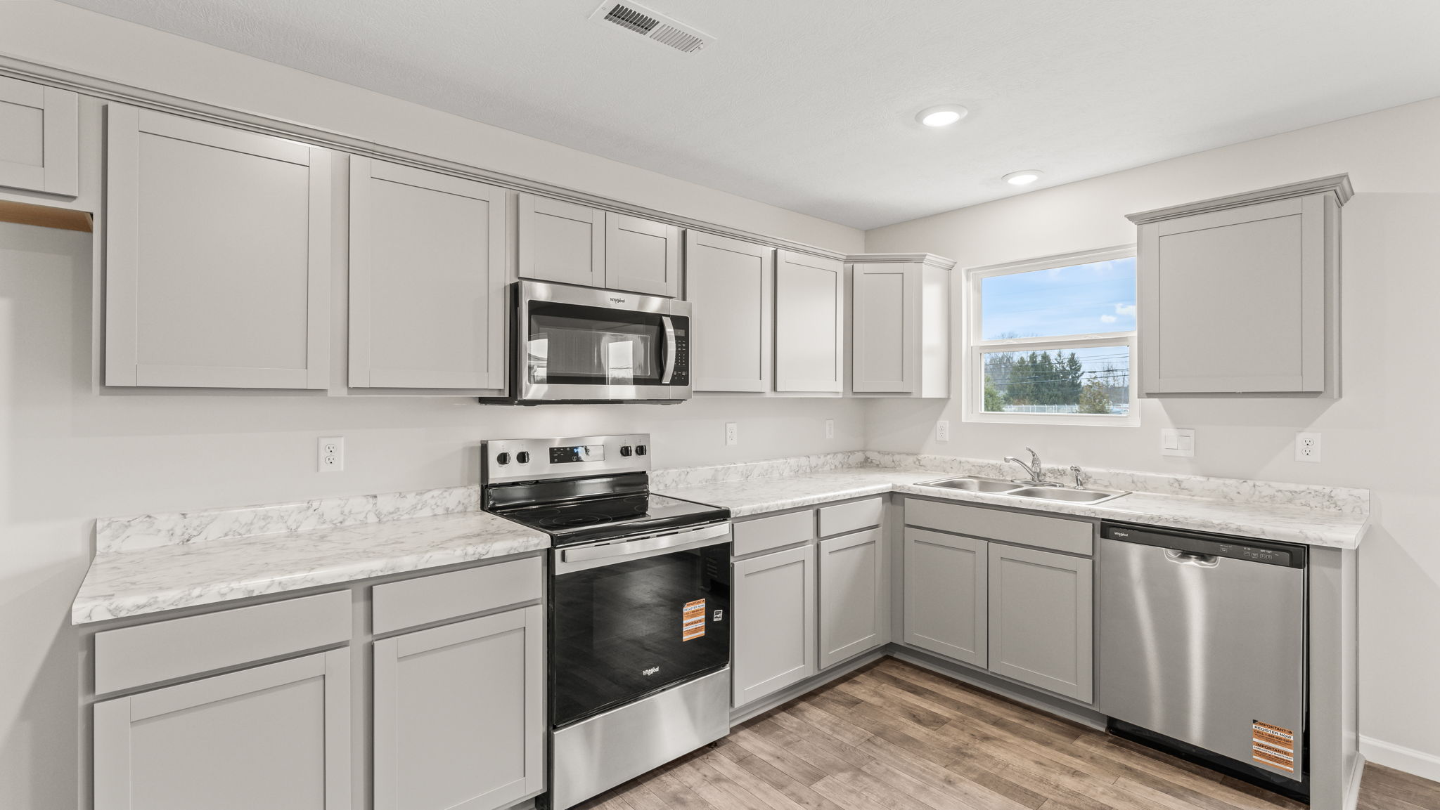 three-quarter view of kitchen with appliances