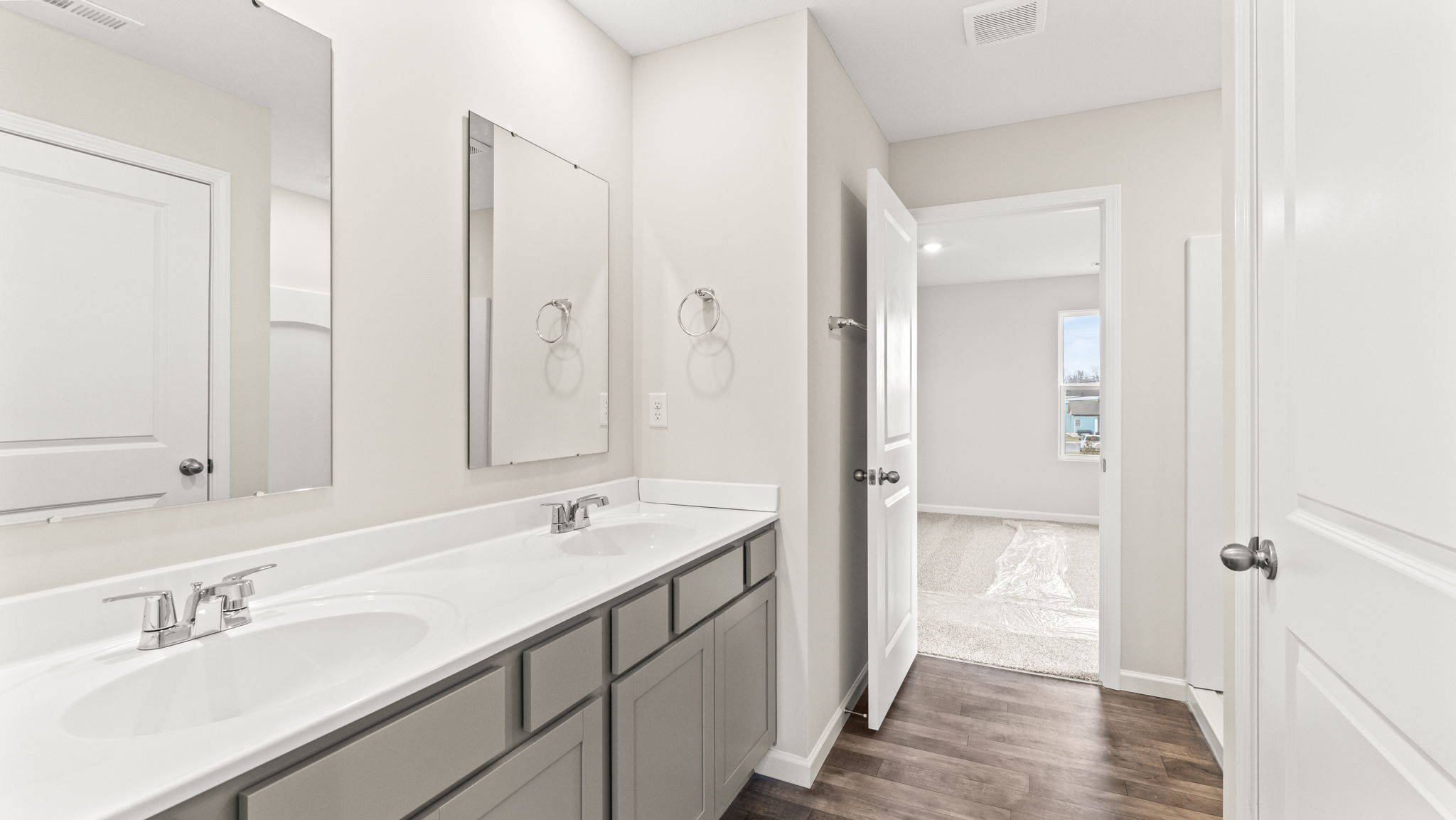 Primary bathroom double bowl vanity