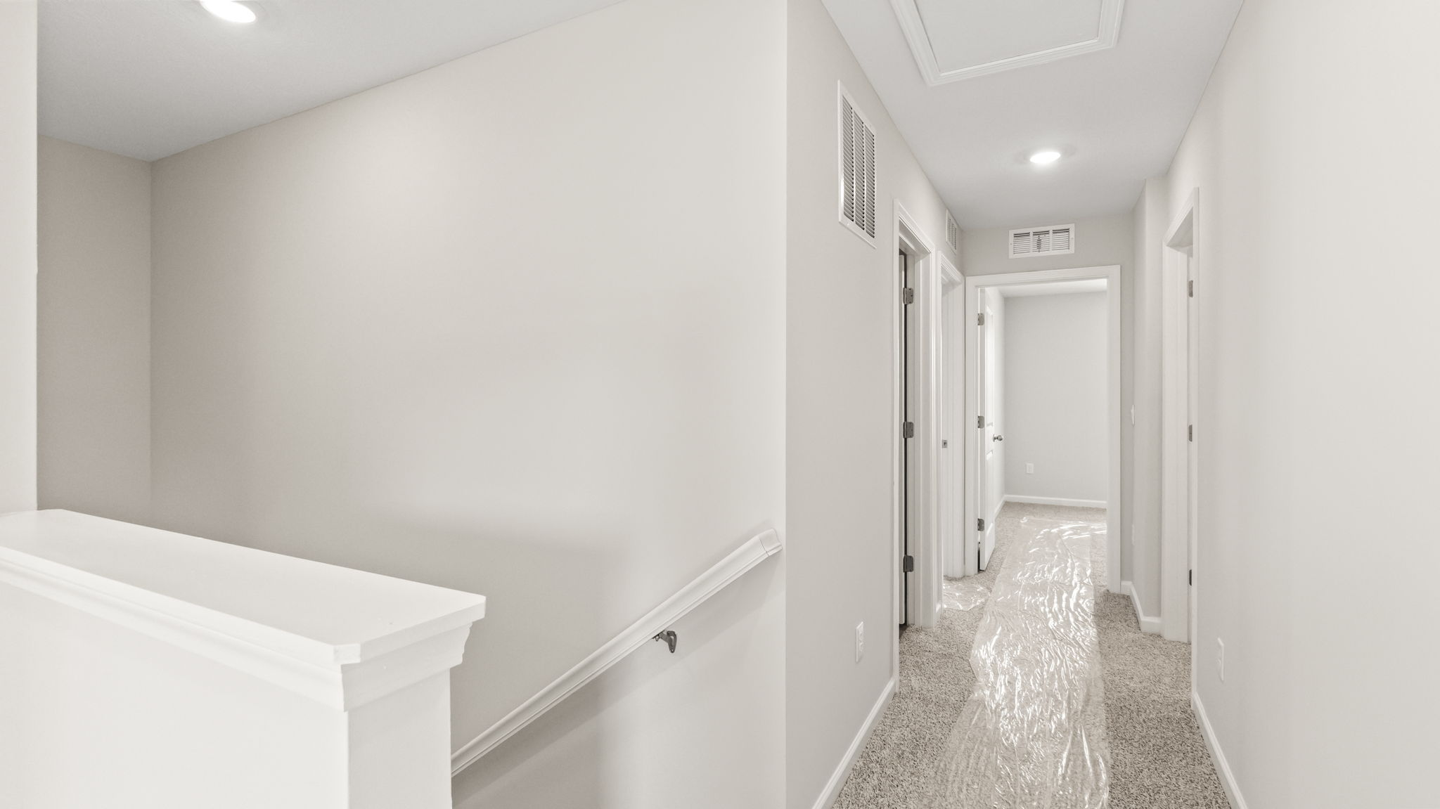 Upstairs landing with view of hallway