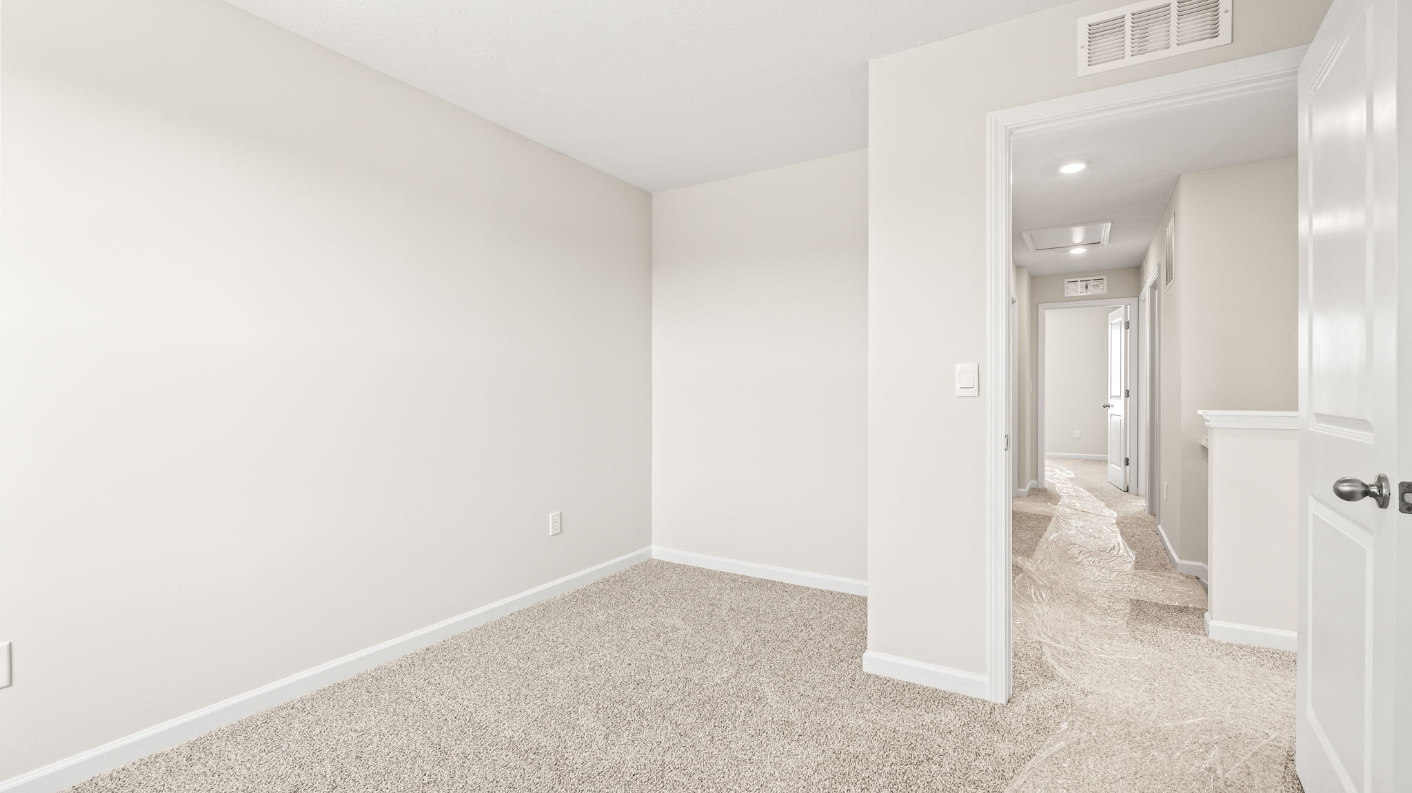 Carpeted bedroom