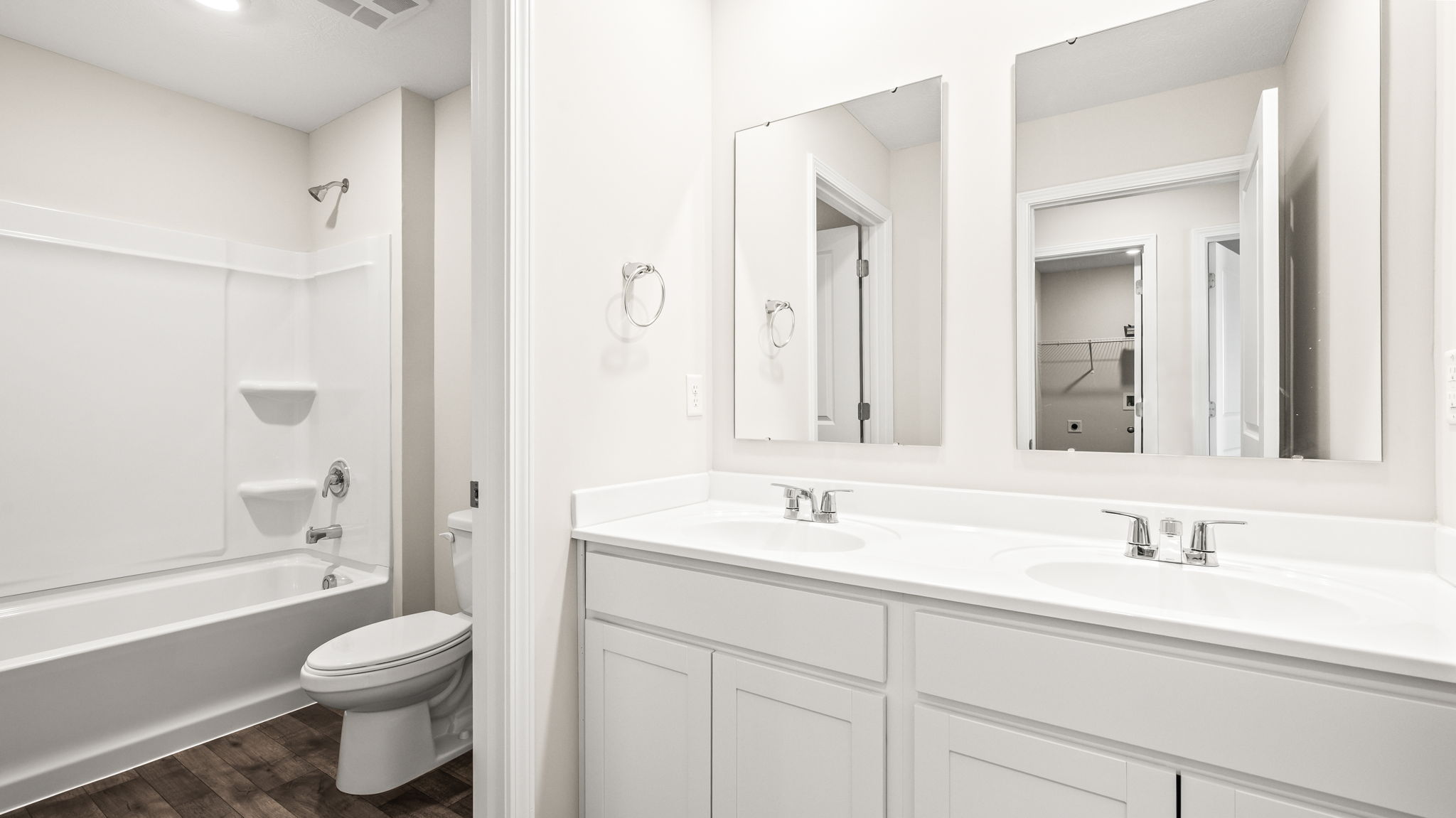 Bathroom with tub, toilet, and sink