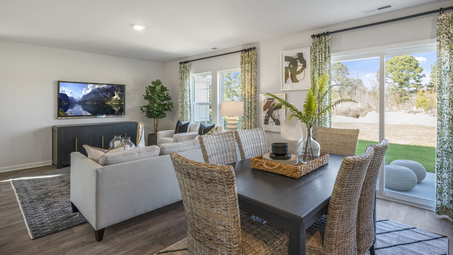 open concept dining and living room with 6-person table.