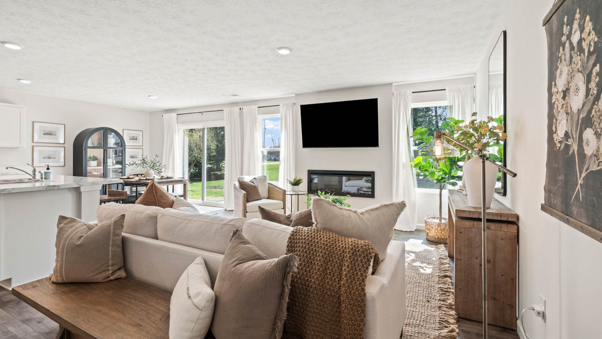 view of modern open concept living room and dining room.